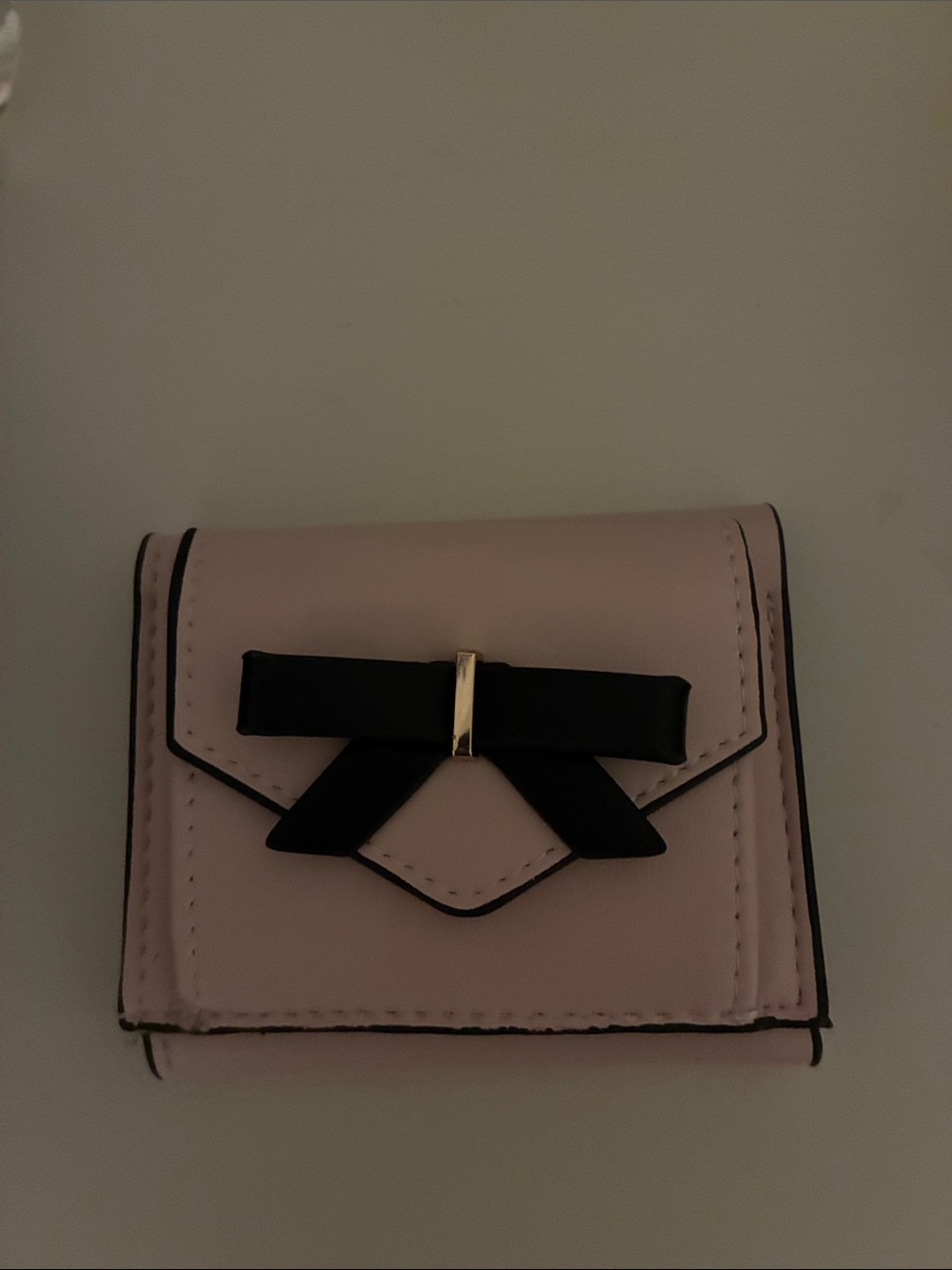 Claire's Light Pink Wallet with Black Bow and Gold Accent